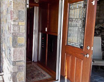 A residential elevator outside the house